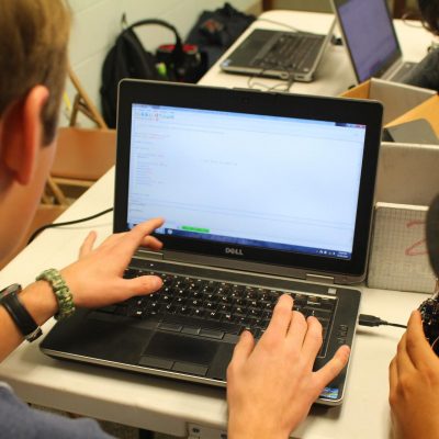 This computer class for teens teaches coding in c. They work in teams programming microcontrollers.