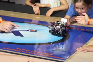 At the end of our Summer Camp for Kids compete with robots they built and programmed at Maker Faire Detroit in Michigan
