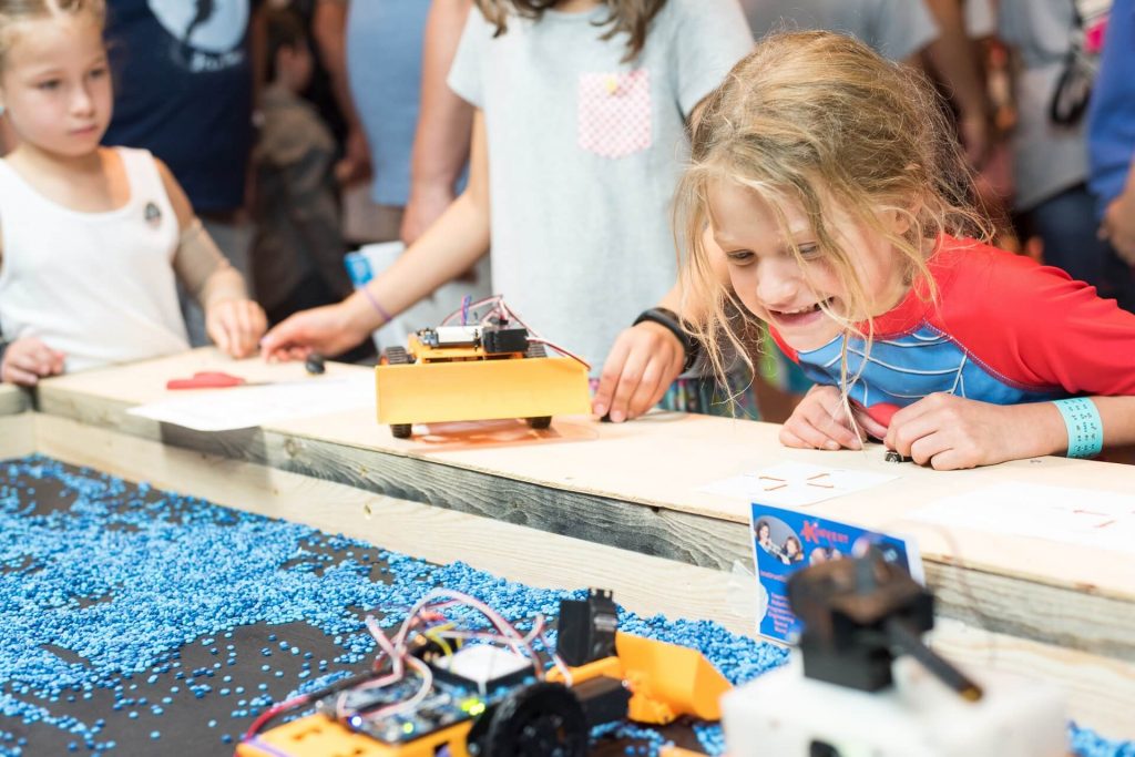 Students in the Kinvert Mentor program made construction robots for Maker Faire Detroit