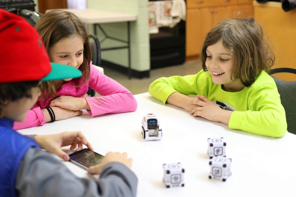 In Robotics for Kids and Teens Kinvert students use the Anki Cozmo SDK and Code Lab to Program a Robot Kit